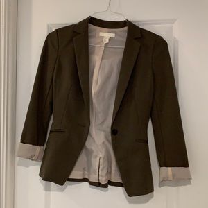 Green H&M blazer with pink lining
